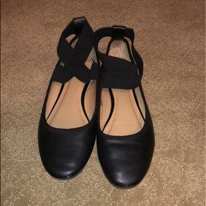 black flats with elastic cross straps